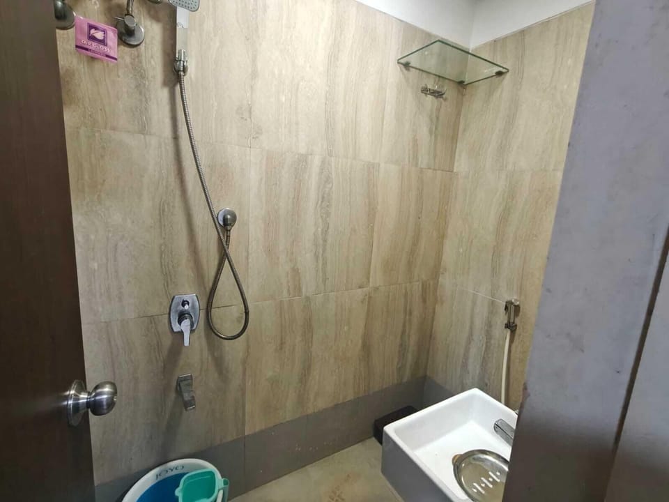 Shower, towels, soap, shampoo
