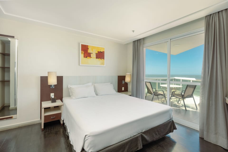Suite, 1 Queen Bed (Master) | In-room safe, desk, laptop workspace, iron/ironing board