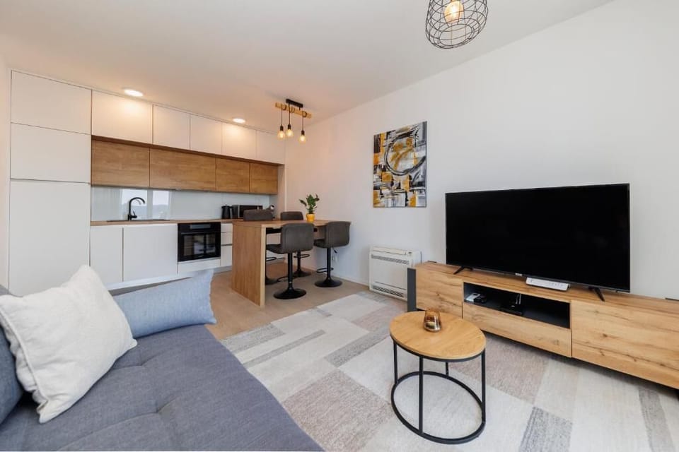Apartment, Balcony, Sea View | Living area | 40-inch LED TV with digital channels, Netflix, streaming services