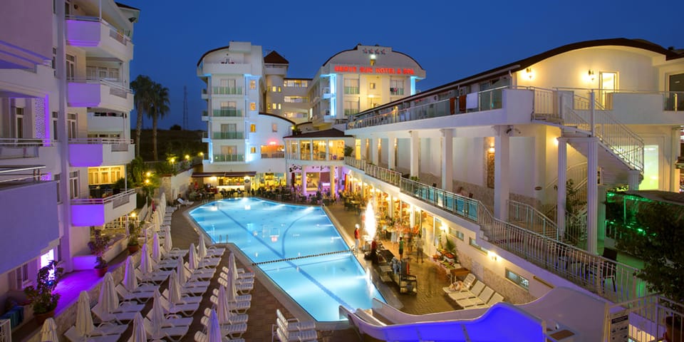 Indoor pool, outdoor pool, pool umbrellas, sun loungers
