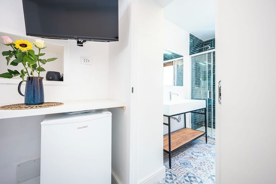 Double Room | Bathroom | Shower, hair dryer, towels, soap