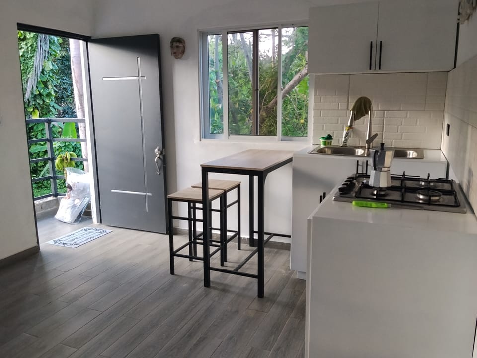 Mini-fridge, cookware/dishes/utensils