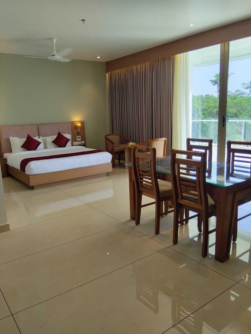 Luxury Suite, Garden View | Living area | 43-inch LED TV with digital channels