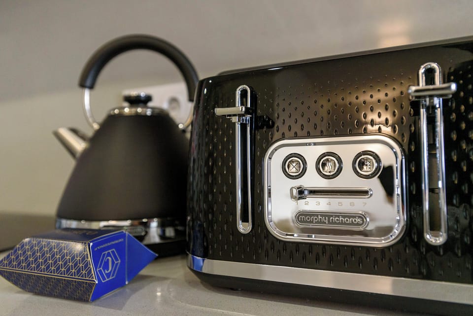 Deluxe Duplex, City View | Coffee and/or coffee maker