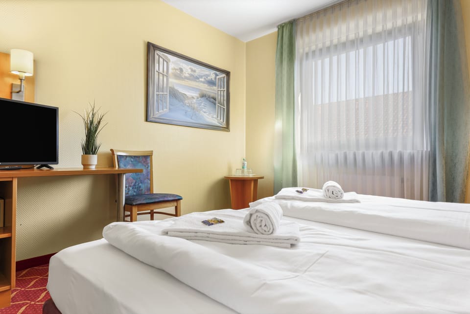 Comfort Double Room, City View | Desk, laptop workspace, blackout drapes, iron/ironing board