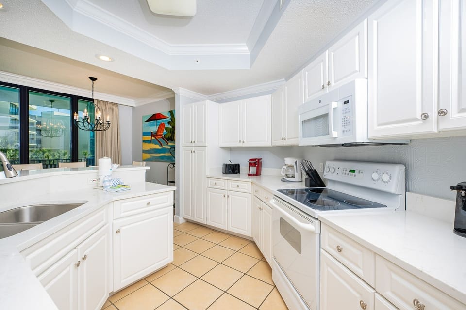 Condo, 2 Bedrooms | Private kitchen | Coffee/tea maker, fridge, oven