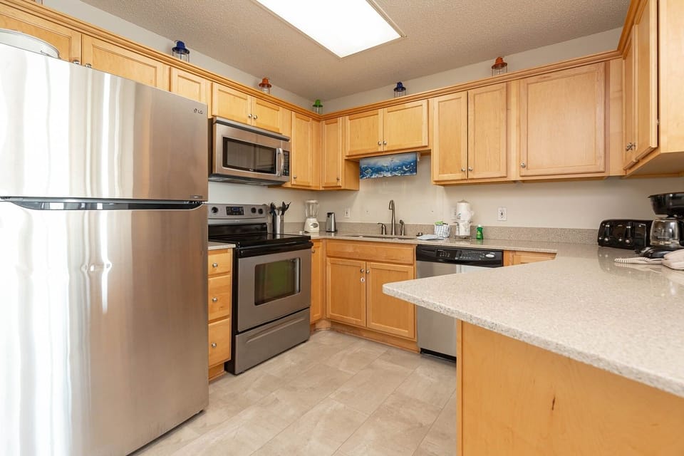 Condo, 2 Bedrooms | Private kitchen | Coffee/tea maker, fridge, oven