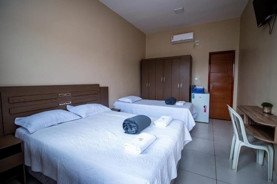 Triple Room, City View | Desk, laptop workspace, iron/ironing board, free WiFi