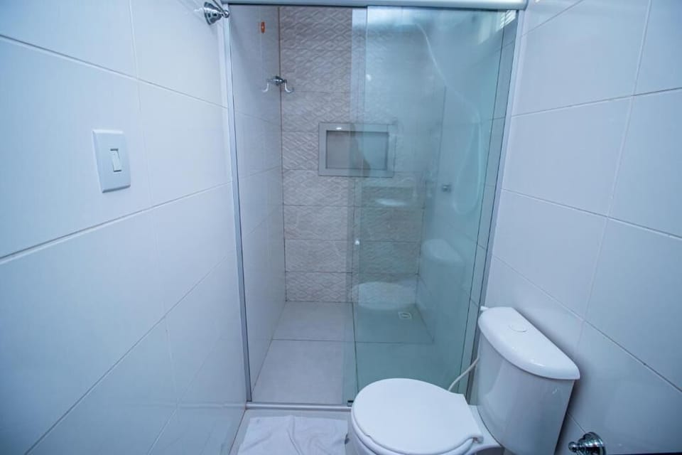 Shower, towels, soap, toilet paper