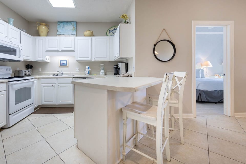 Condo, 2 Bedrooms | Private kitchen | Coffee/tea maker, fridge, oven