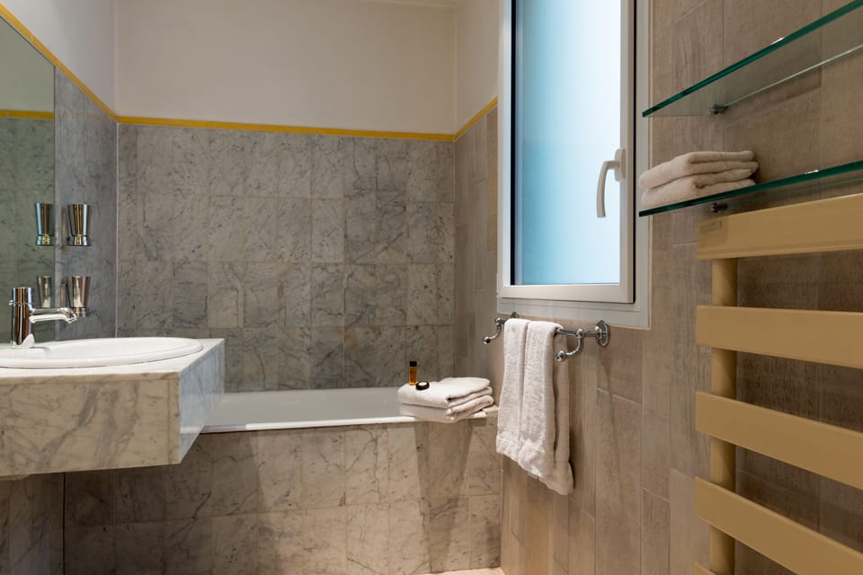 Standard Double Room | Bathroom | Combined shower/tub, deep soaking tub, free toiletries, hair dryer