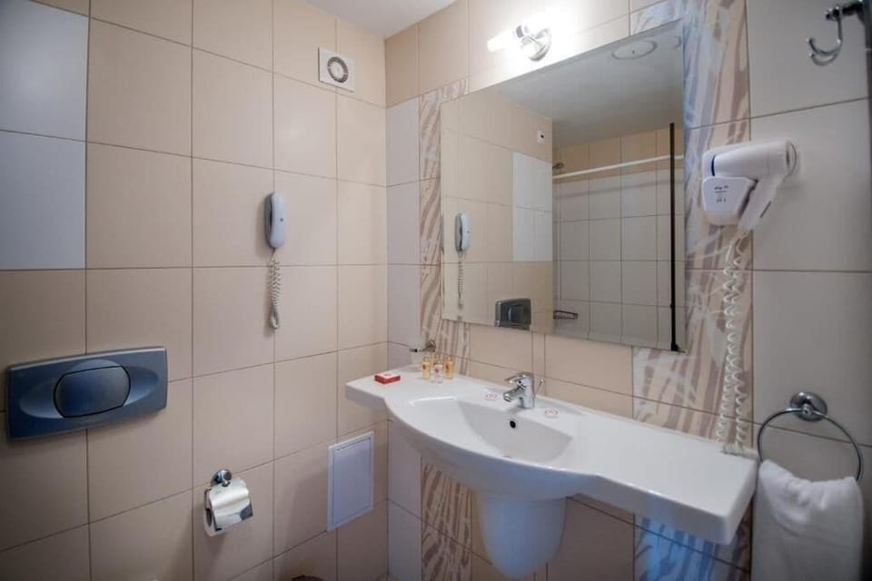 Hair dryer, towels, soap, shampoo
