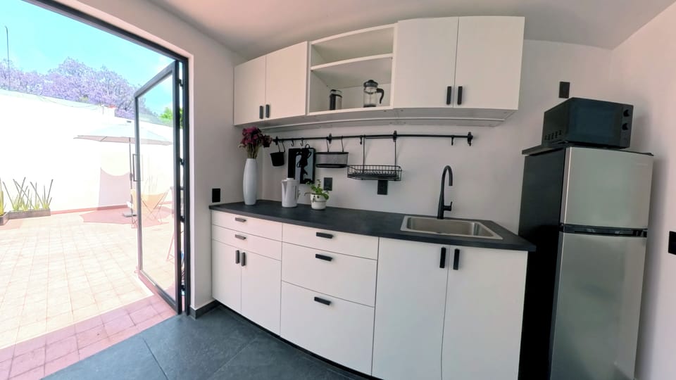 Deluxe Loft, 2 Bedrooms, Pets Not Allowed, Annex Building | Private kitchen | Fridge, microwave, stovetop, coffee/tea maker