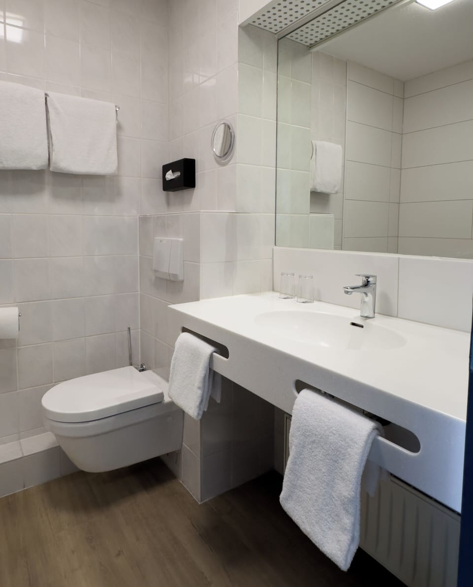 Deep soaking tub, eco-friendly toiletries, hair dryer, towels