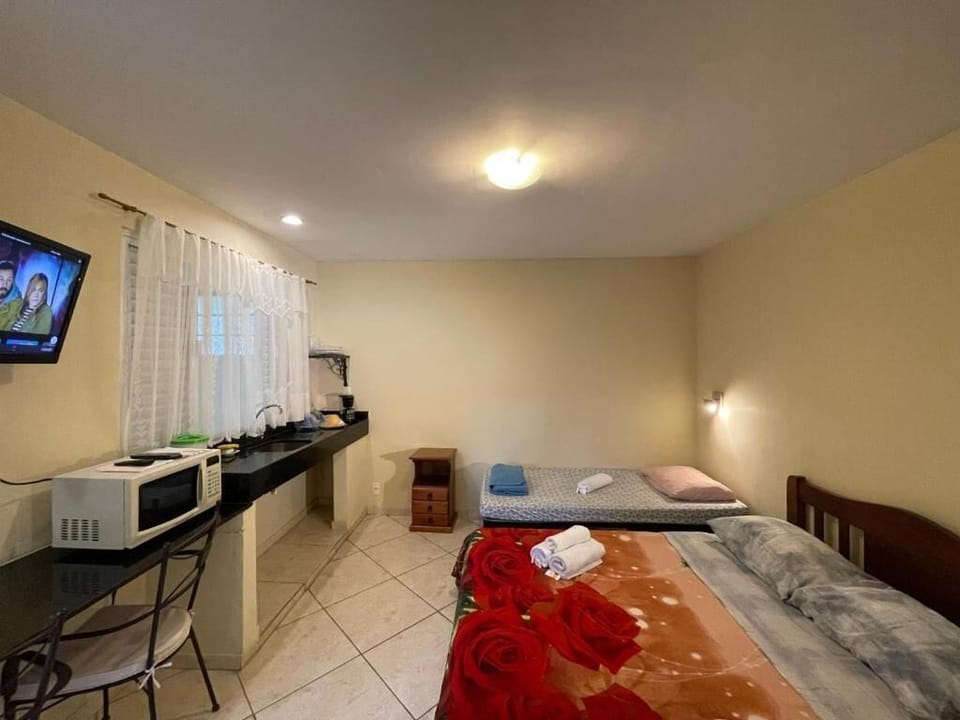Standard Triple Room, Garden View | Private kitchen