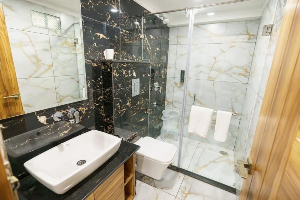 Luxury Suite, Balcony, Mountain View | Bathroom | Shower, hair dryer, towels, soap