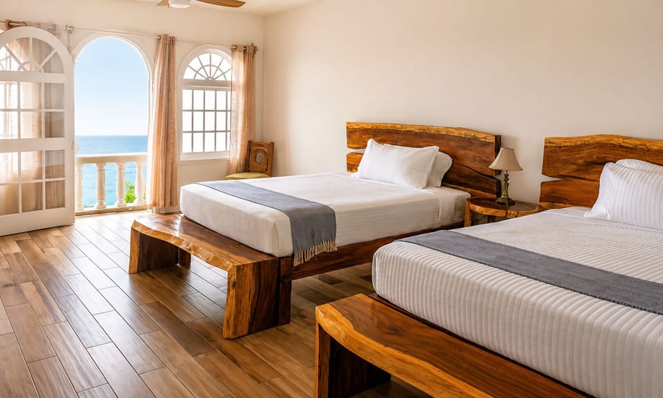 Luxury Room, 2 Queen Beds, Ocean View | In-room safe, desk, laptop workspace, blackout drapes