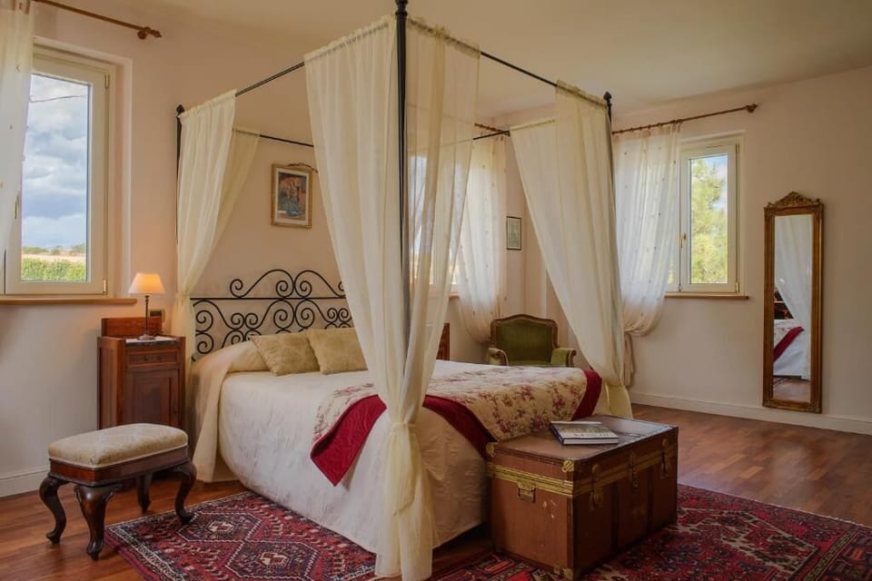 Comfort Triple Room, Garden View | Minibar, in-room safe, blackout drapes, soundproofing