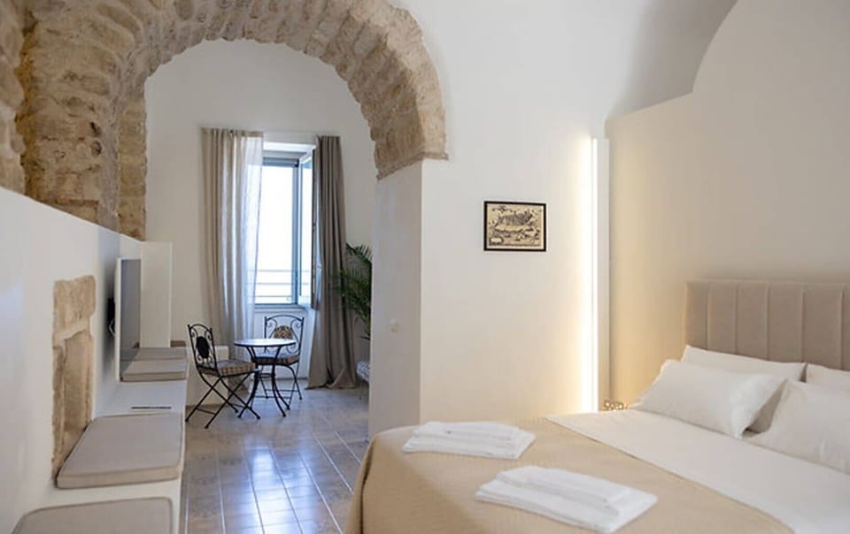 Deluxe with Patio and Sea view | Egyptian cotton sheets, premium bedding, down comforters, in-room safe