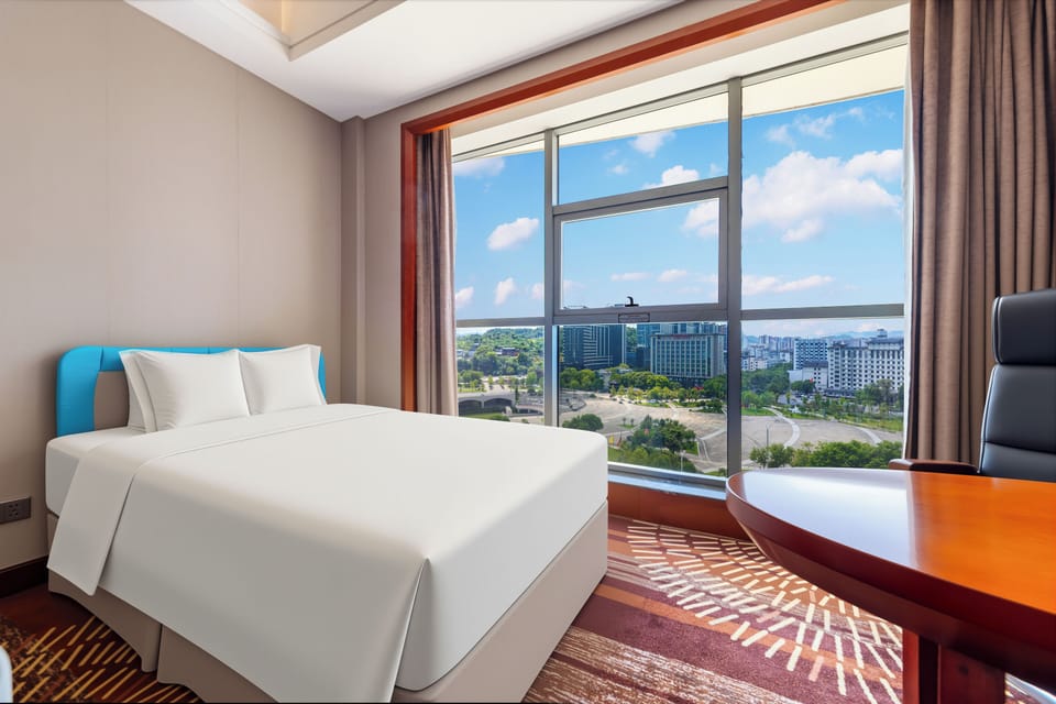 Family Suite, Balcony, City View | Premium bedding, in-room safe, blackout drapes, soundproofing
