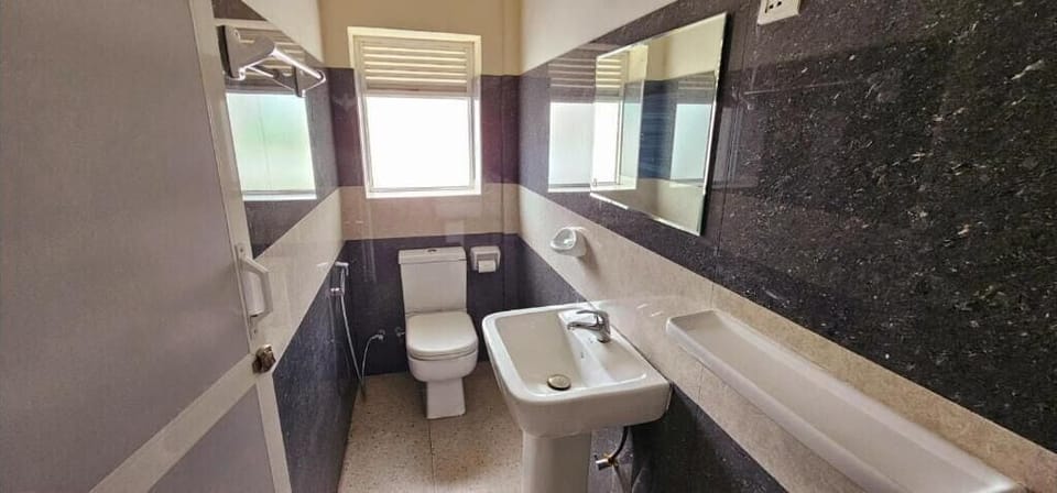 Shower, towels, soap, toilet paper