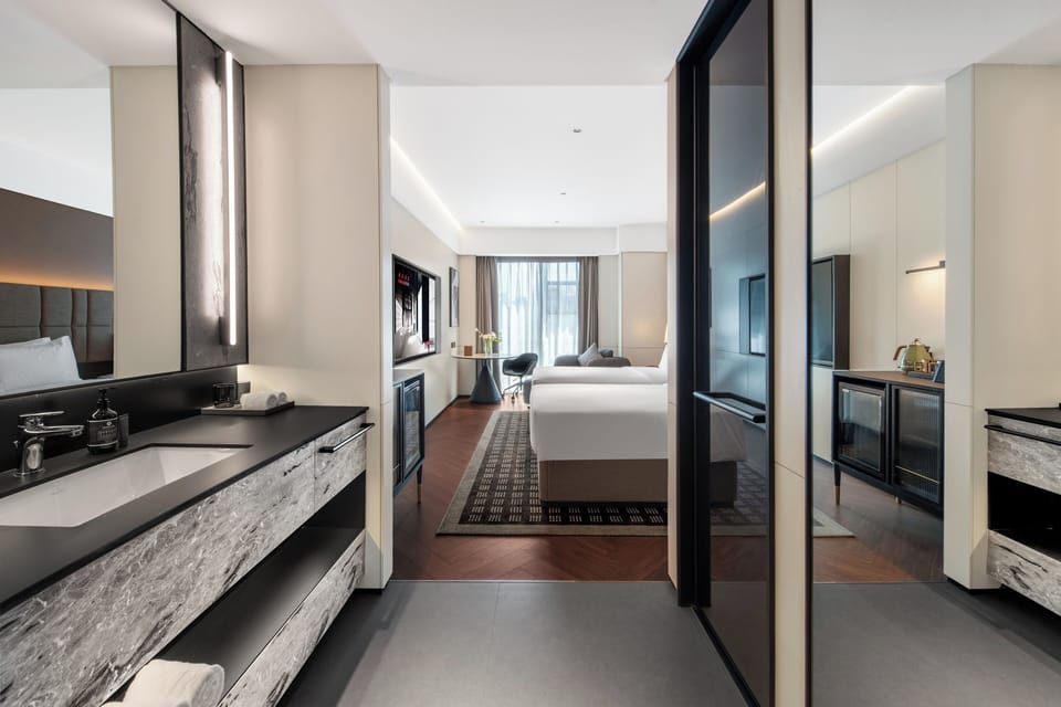 Superior Twin Room, City View | Down comforters, minibar (free items), desk, laptop workspace