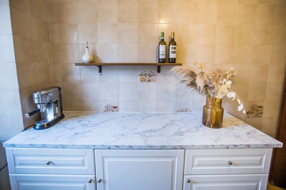 Apartment, Patio, Courtyard View | Private kitchen | Fridge, stovetop, cookware/dishes/utensils