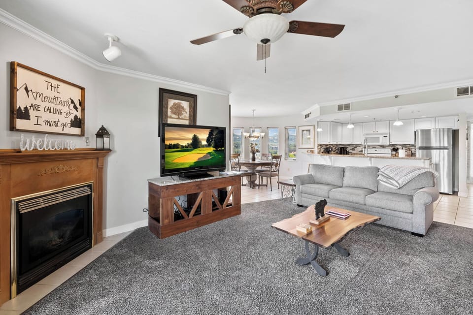 Family Condo, 2 Bedrooms, Balcony, Mountain View | Living room | 32-inch Smart TV with digital channels, fireplace