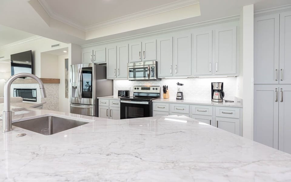 Condo, 4 Bedrooms | Private kitchen | Coffee/tea maker, fridge, oven