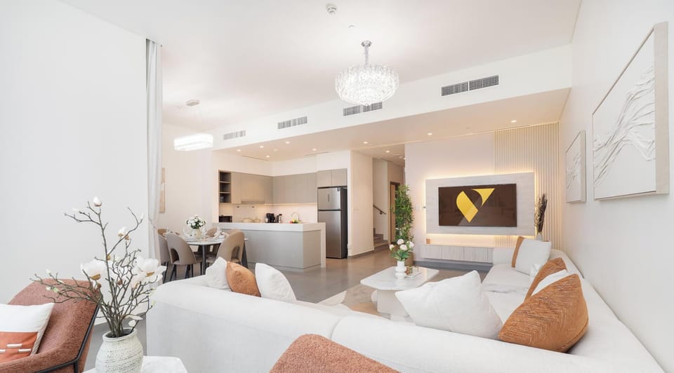 Luxury Apartment, Balcony, City View | Living area | 65-inch Smart TV with cable channels