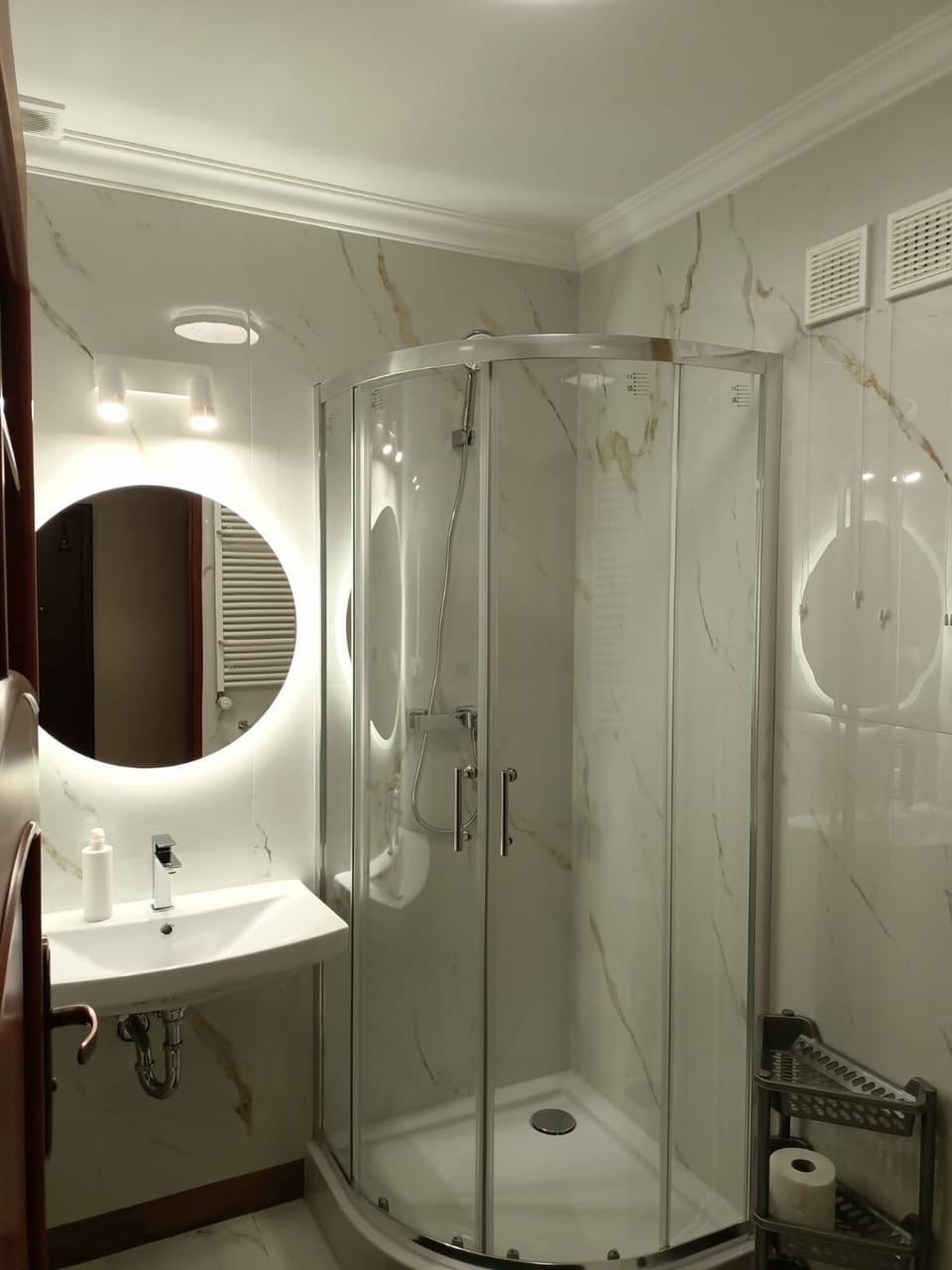 Shower, towels, toilet paper
