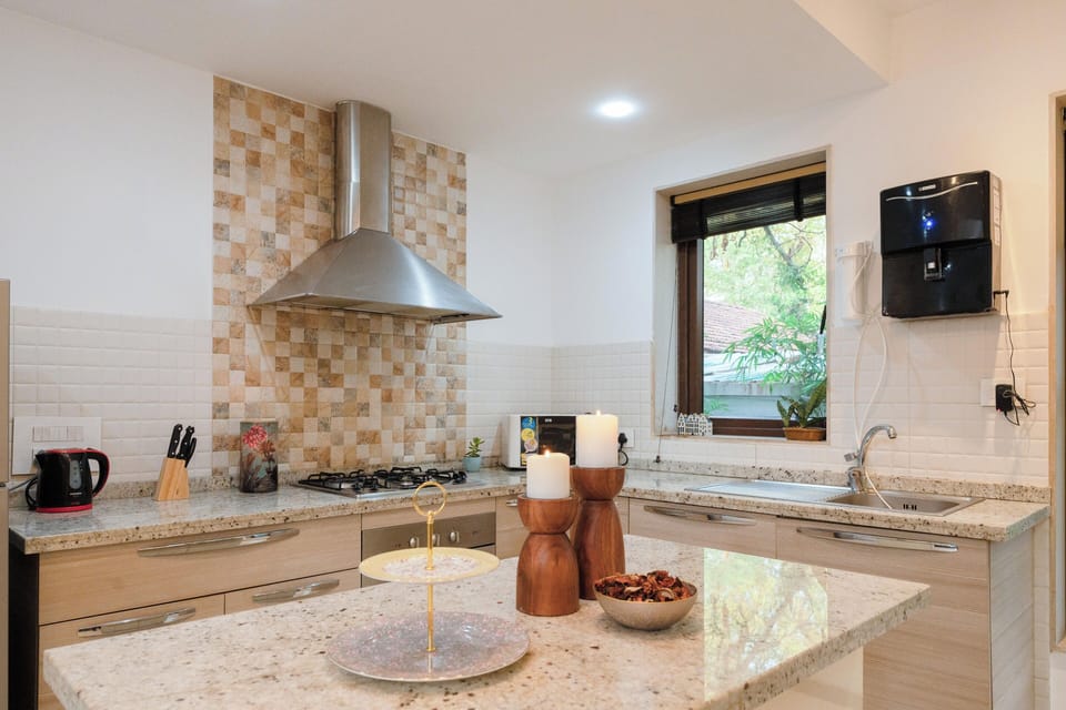 Villa, 3 Bedrooms, Pool View, Beachside | Private kitchen | Electric kettle, dining tables