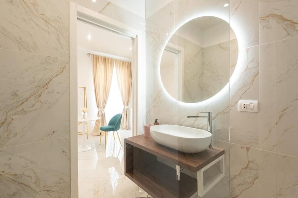 Luxury Suite, Balcony, City View | Bathroom | Free toiletries, hair dryer, slippers, bidet