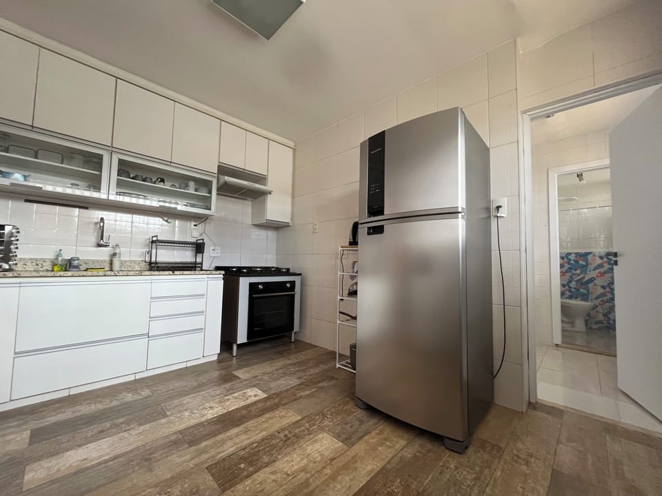 Mini-fridge, microwave, oven, cookware/dishes/utensils