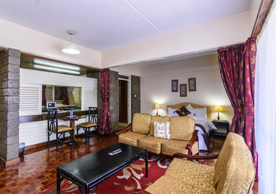 Studio Apartment | Living room | Flat-screen TV