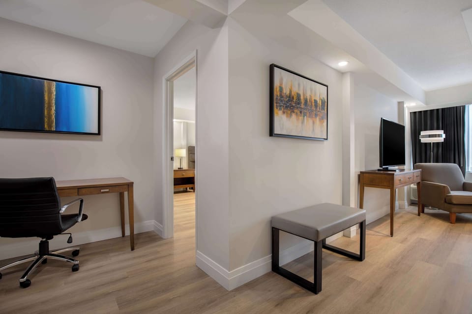 Premium bedding, down comforters, pillowtop beds, in-room safe