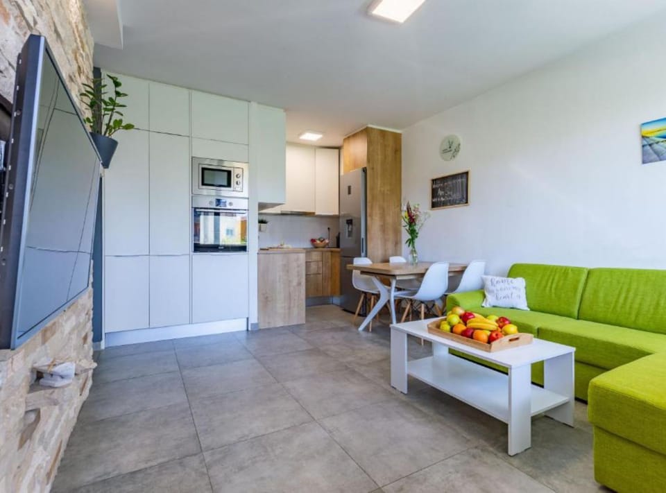 Apartment (Two Bedroom Apartment) | Living room | 32-inch flat-screen TV with cable channels
