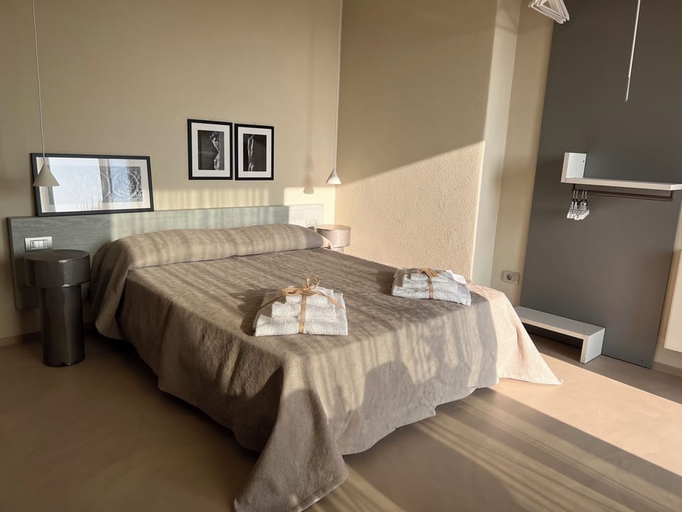 Deluxe Double Room, Pool View | Down comforters, desk, laptop workspace, free cribs/infant beds