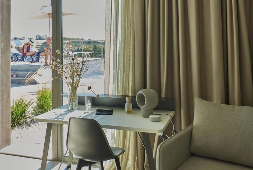 Deluxe Double Room, Pool View | Living area | 28-inch Smart TV with digital channels, Netflix, streaming services