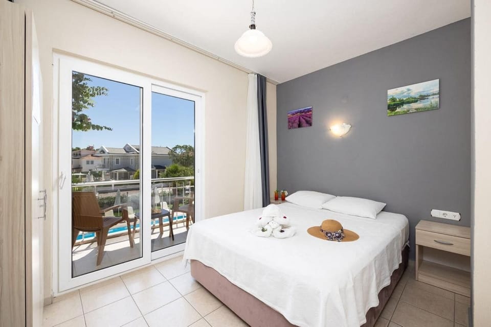 Family Apartment with Land or Pool View | In-room safe, iron/ironing board, free WiFi