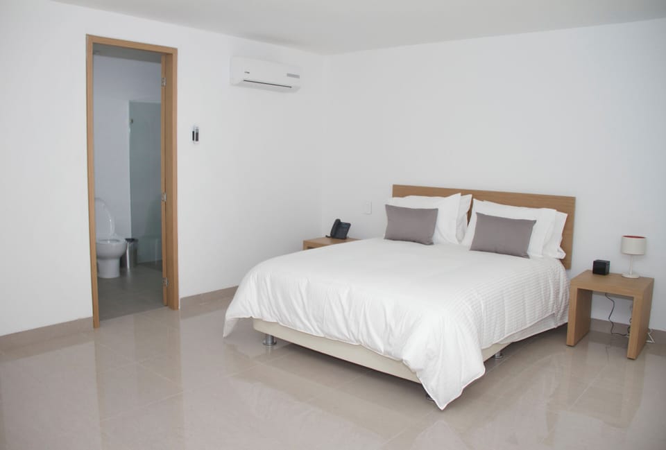 Deluxe Double Room, Balcony | Desk, laptop workspace, free WiFi
