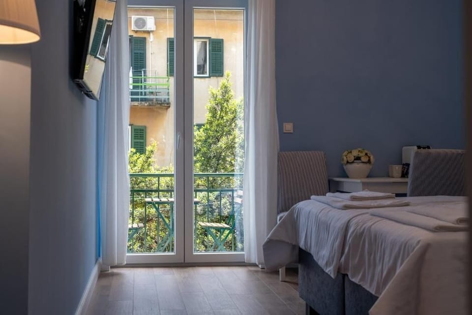 Comfort Room, Balcony, Garden View | Egyptian cotton sheets, premium bedding, memory foam beds, in-room safe