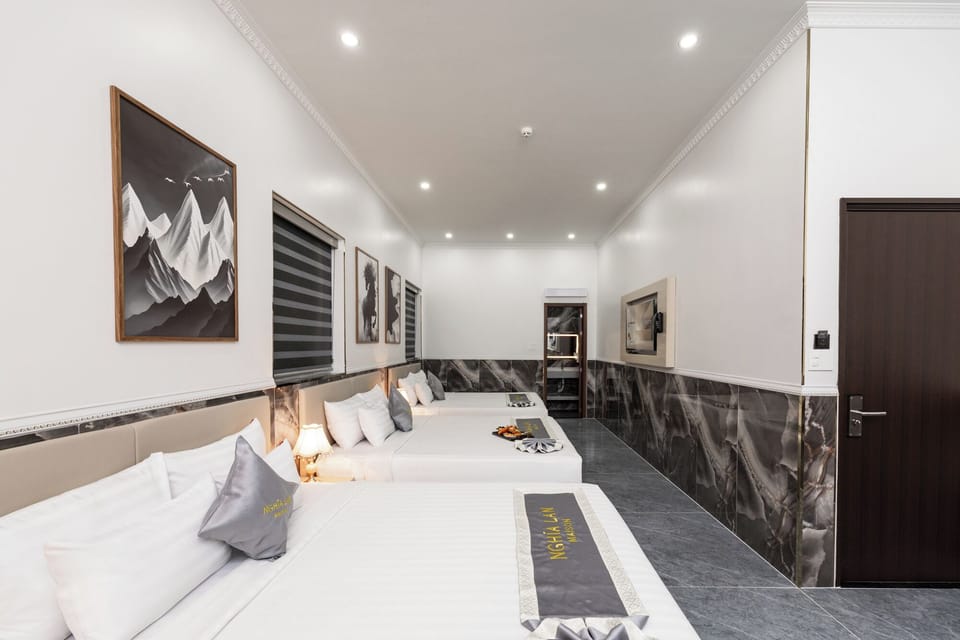 Luxury Triple Room, Courtyard View | Desk, laptop workspace, free WiFi