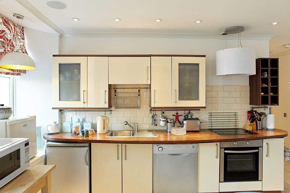 Superior Apartment, 2 Bedrooms | Private kitchen | Fridge, microwave, stovetop, dishwasher