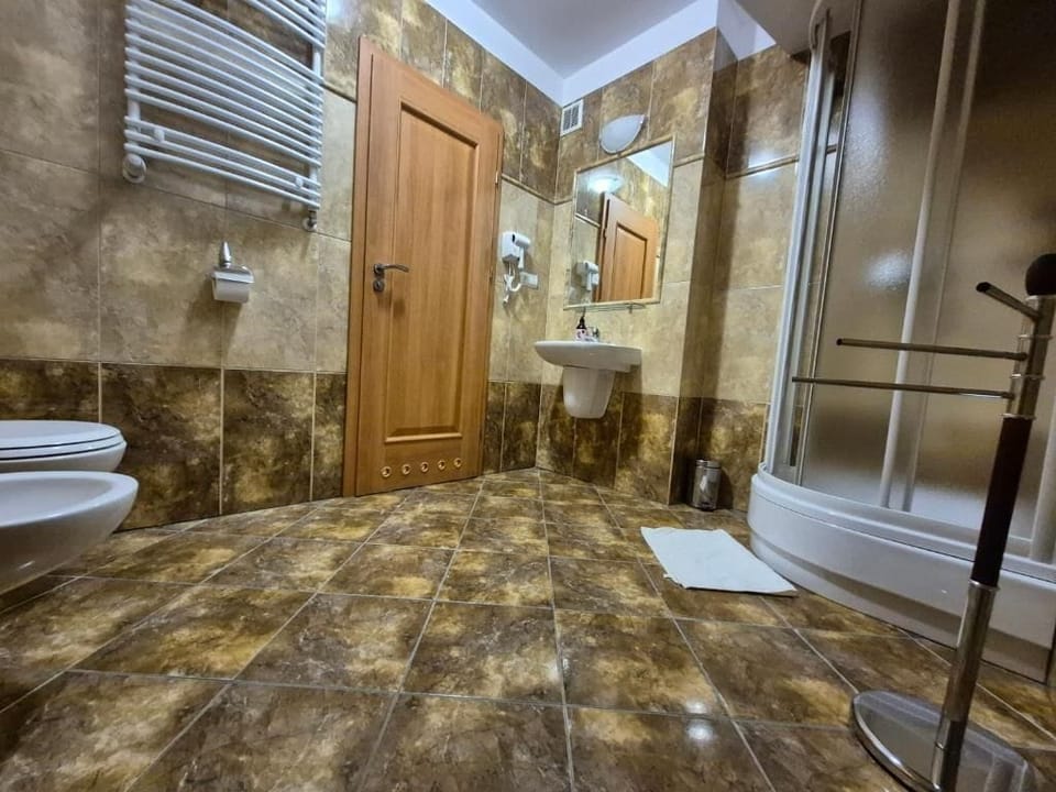 Double Room, Garden View | Bathroom | Shower, hair dryer, towels, soap