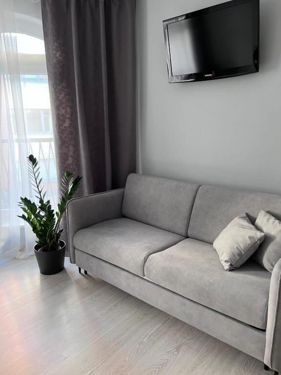 Superior Quadruple Room | Living area | TV, printers