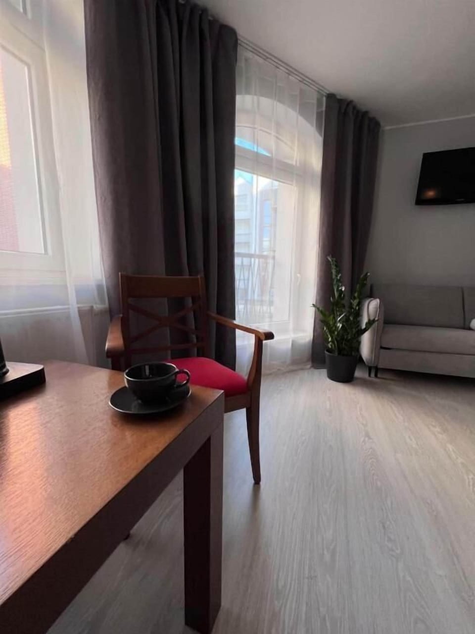 Superior Quadruple Room | Living area | TV, printers
