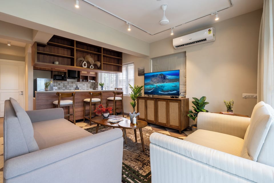 Apartment, 3 Bedrooms, Balcony | Living area | 50-inch Smart TV with digital channels
