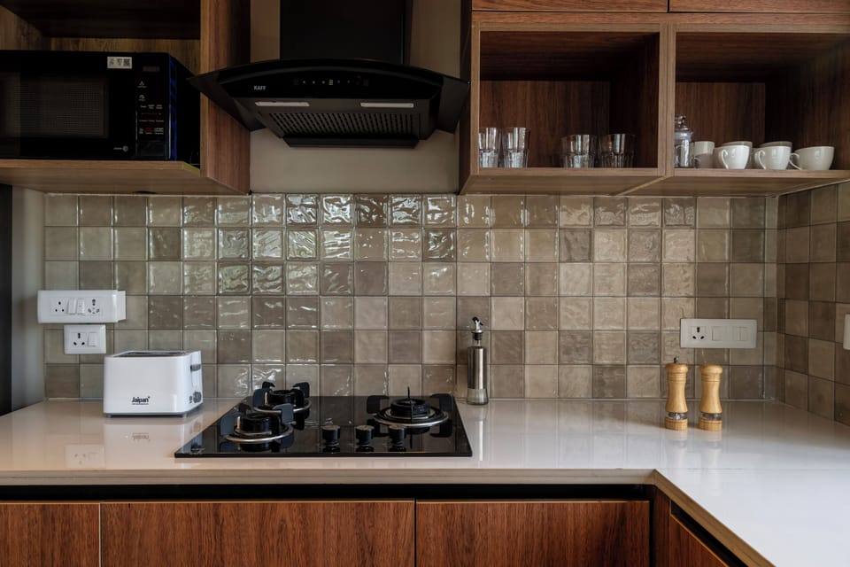 Apartment, 3 Bedrooms, Balcony | Private kitchen | Electric kettle, dining tables