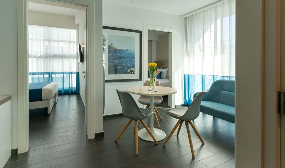 Family Suite | Living area | LCD TV, pay movies